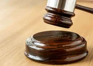 Çocuk Pornografisi Suçu: Cezası, Deliller ve Yargıtay Kararları 1 closeup gavel judgement concept 1